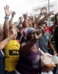 واکنش مثبت جهاني به آشتي کوبا و آمریکا