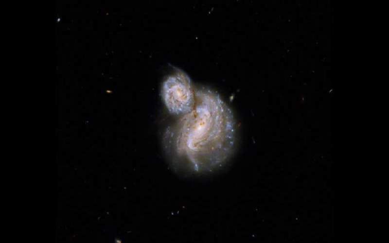 تصویر هابل از ۲ کهکشان مارپیچی عجیب