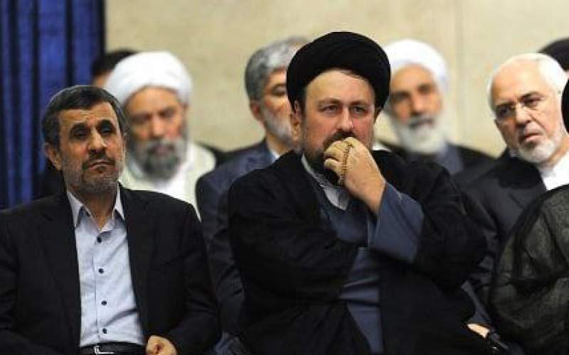 نگاه معنادار ظریف به احمدی‌نژاد در مراسم حرم