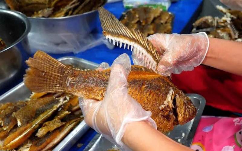 پخت جالب ماهی تیلاپیا و برنج در تایلند